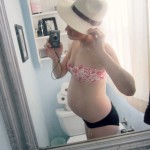 SHOWING OFF THE BUMP IN BIKINIS